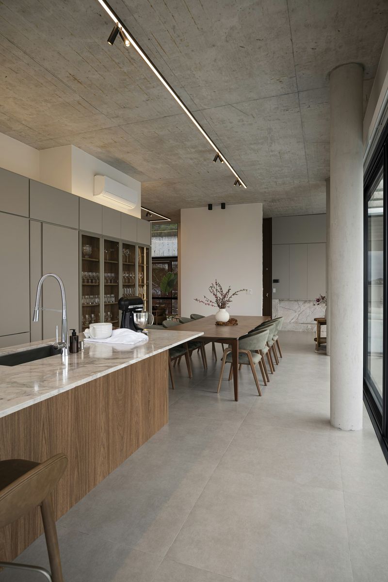 Modern kitchen and dining with concrete ceiling, Rancho Santa Fe.